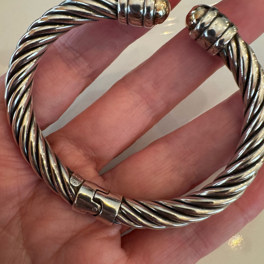 Sterling Silver and 14 kt gold Hinged Bangle Bracelet